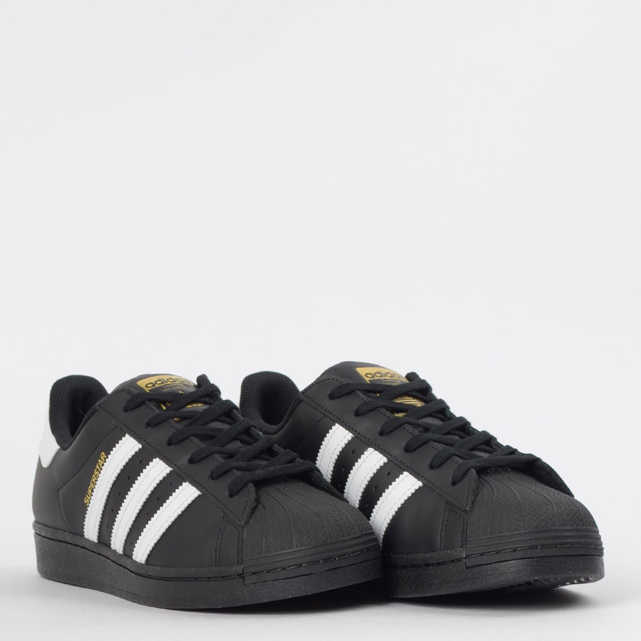 tenis adidas em couro