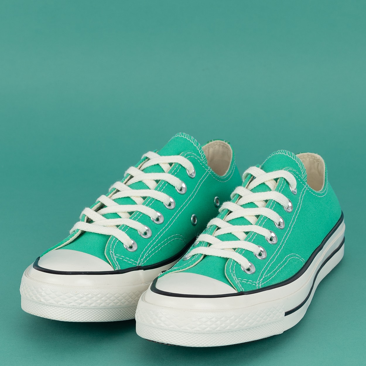 Converse tennis verde on sale