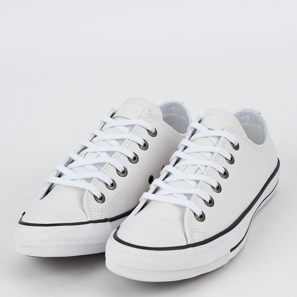 All star de couro branco com hot sale costura preta