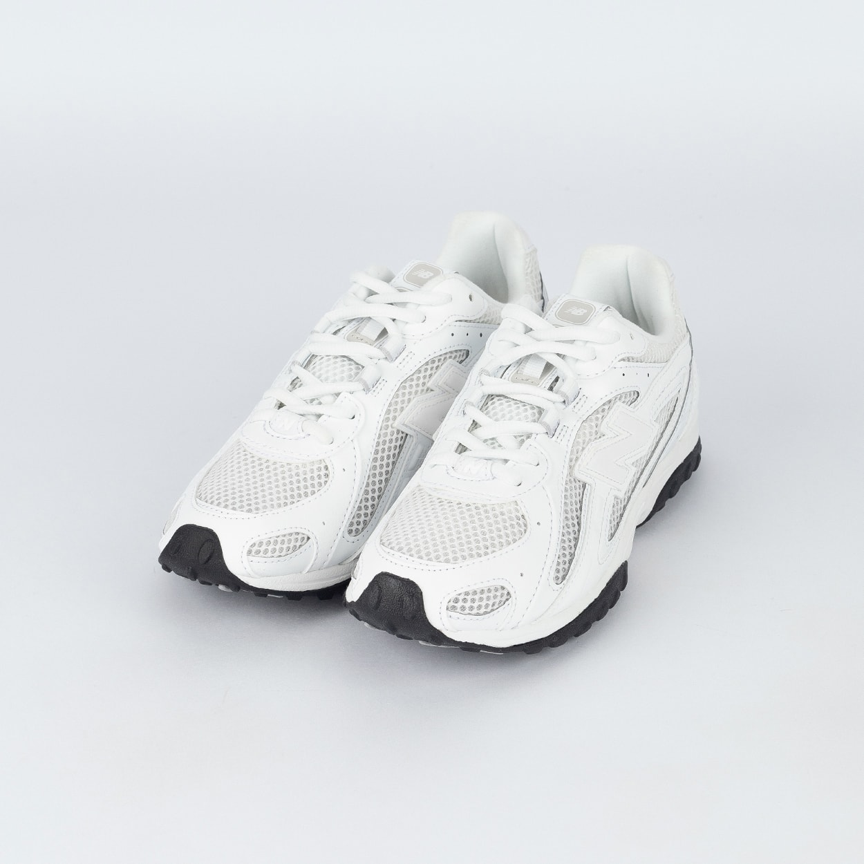 Tênis New Balance 204L Branco Branco U204L2TD