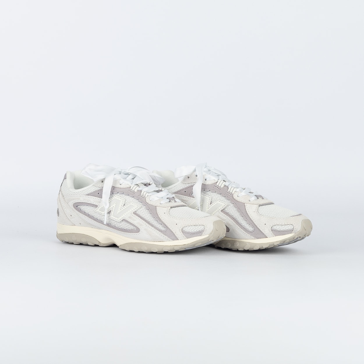 Tênis New Balance 204L Branco Off Cinza U204L6A6