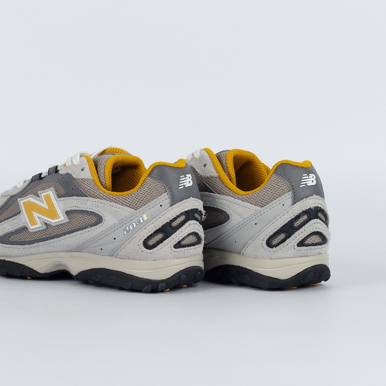 Tênis New Balance 204L Cinza Amarelo U204LNPB