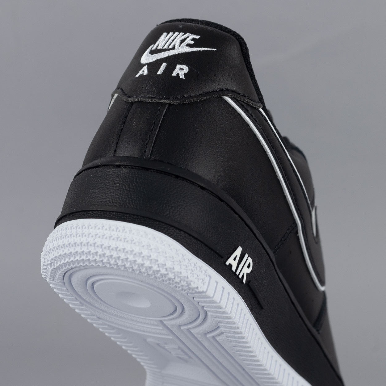 Nike black discount with white swoosh