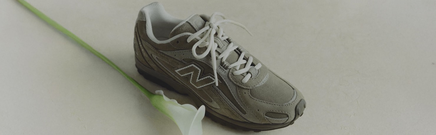 Tênis New Balance 204L Feminino Retro Runner.